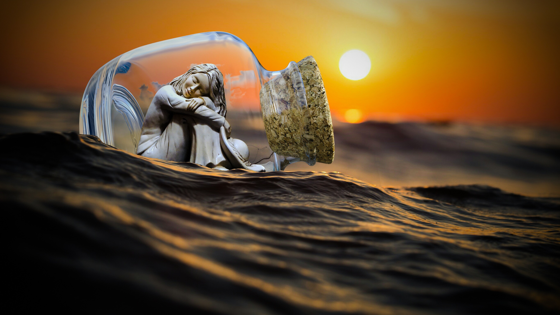 Photomontage Of A Doll Inside a Bottle In The Sea